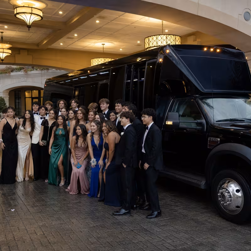 Party bus interior with wraparound leather seating and LED lighting in Wellington